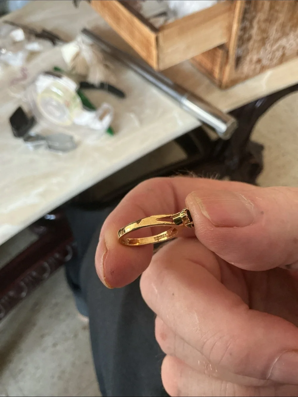 Gold Ring with Black Marquise Center and Clear Accent Stones